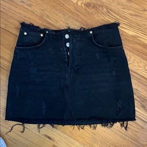 Distressed black mini skirt